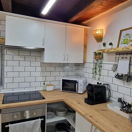 Casita En *